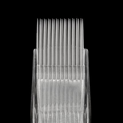 Macro view of a magnum tattoo needle grouping highlighting the precise taper of each individual pin.
