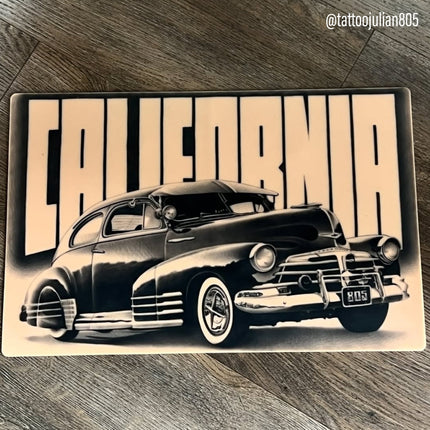 Classic cars tattooed on a practice skin sheet