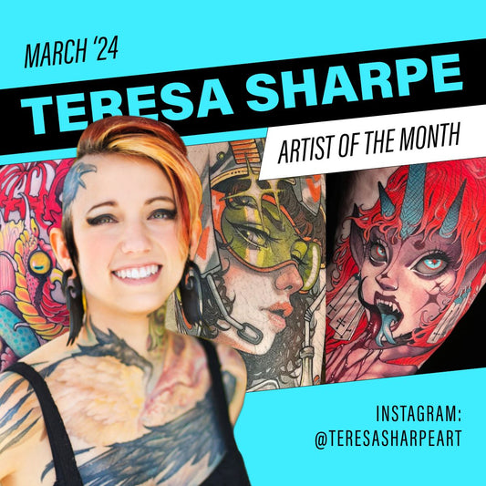 Teresa Sharpe in the foreground in front of her tattoos