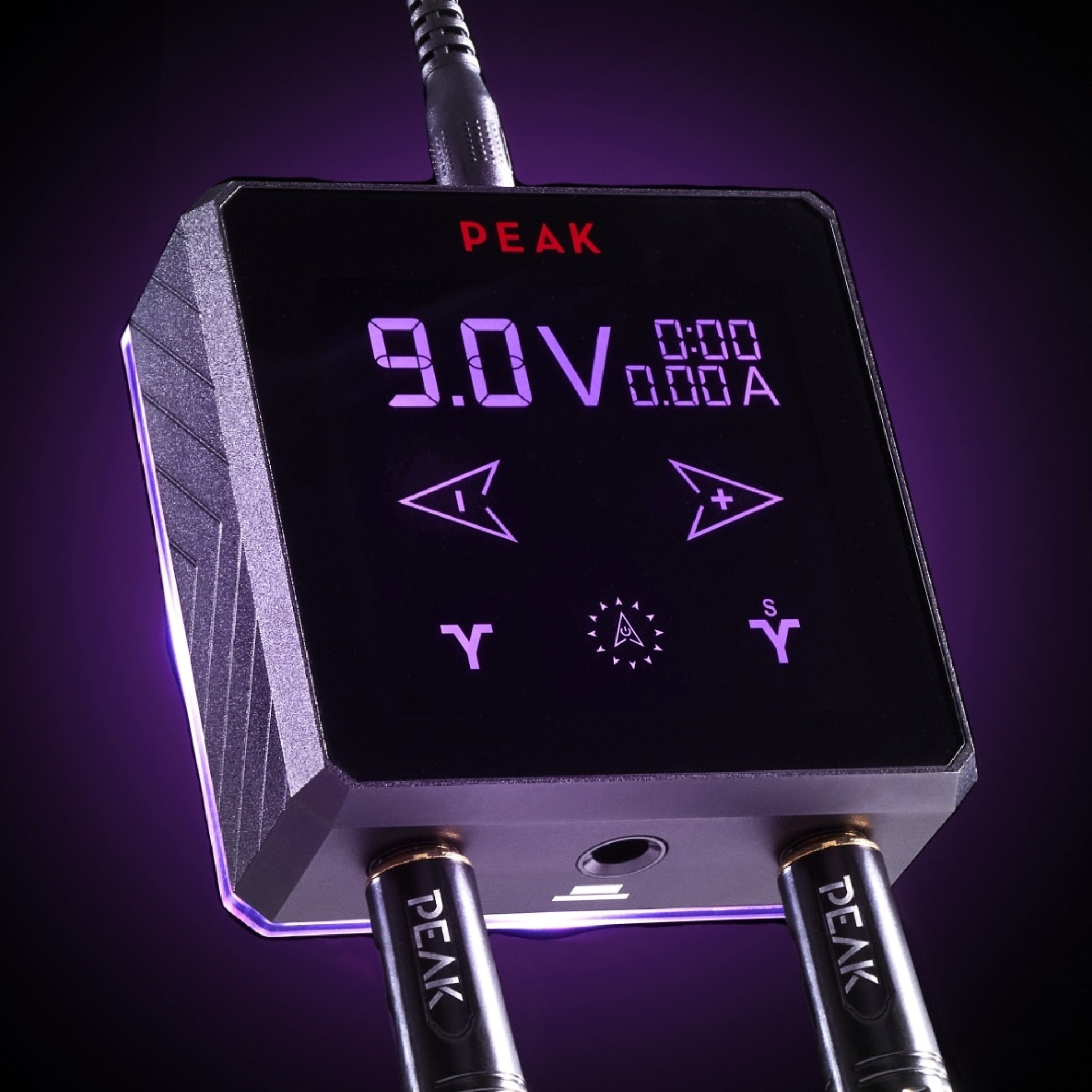 Close-up of a Peak tattoo power supply set to 9.0v The Ultimate Guide to Tattoo Voltage