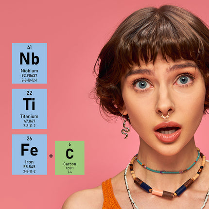 Woman with piercings and hypoallergenic metals.