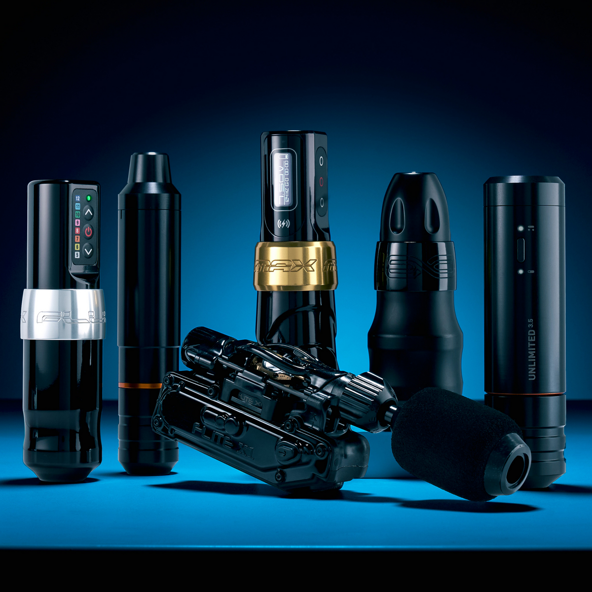 Group shot of rotary tattoo machines with a blue backdrop
