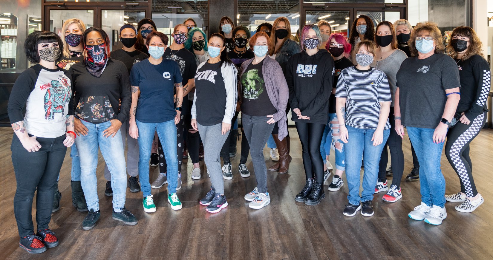 Group shot of all female employees at PainfulPleasures Celebrating the Women of PainfulPleasures: Happy International Women's Day