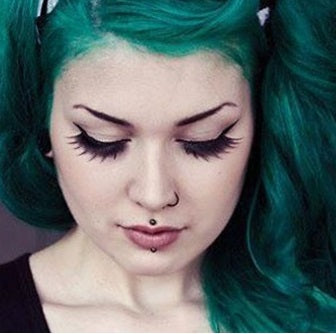 Woman With Cyber Bites Lip Piercings|Smokenhot E-Cigarettes|Labret Studs for Lip Piercings and Cheek Piercings