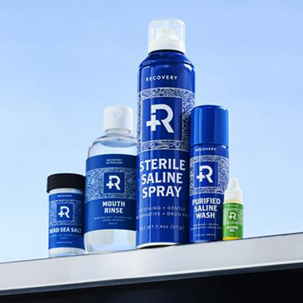 Collection of piercing aftercare supplies by Recovery