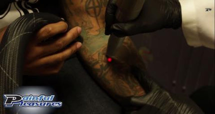 Laser Tattoo Removal Being Performed at The Studio at Painful Pleasures