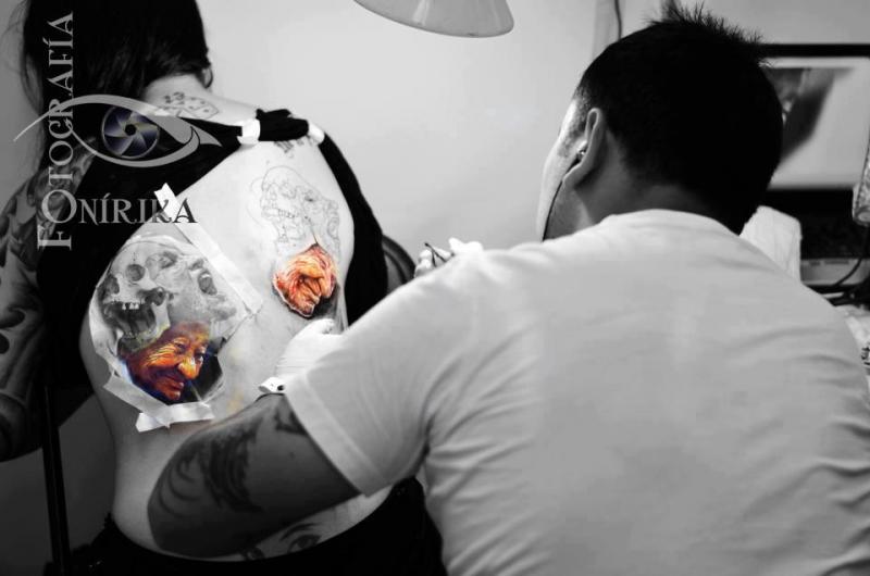 Photo of a Chilean Tattoo Artist Tattooing at a Tattoo Convention in Santiago, by Fotografia Onirika|Tattoo Prints, Artwork &amp; Art Supplies Is Tattooing the Right Profession for You?