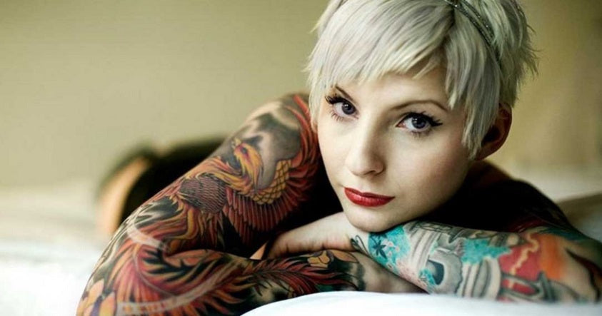Woman With Full Color Tattoo Sleeves Are You a Tattoo Collector?