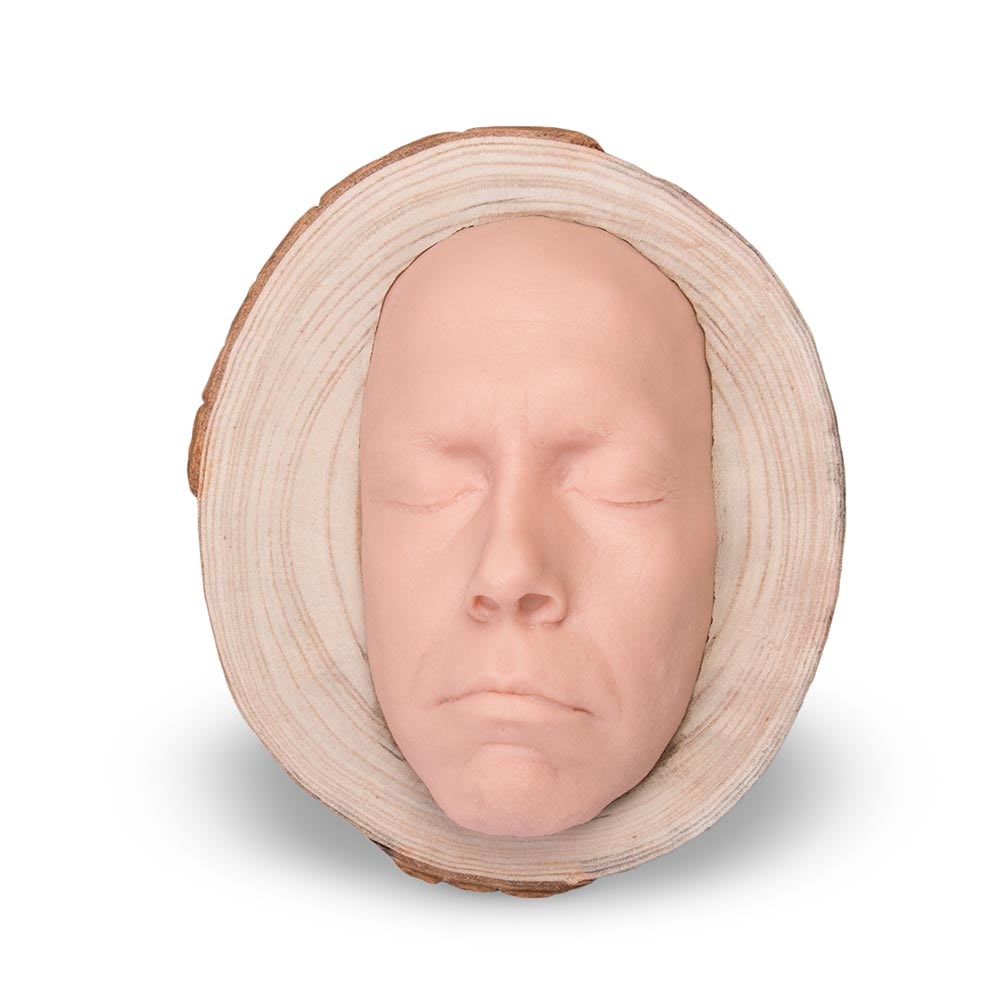 A Pound of Flesh Tattooable Idol Face on Wooden Plank