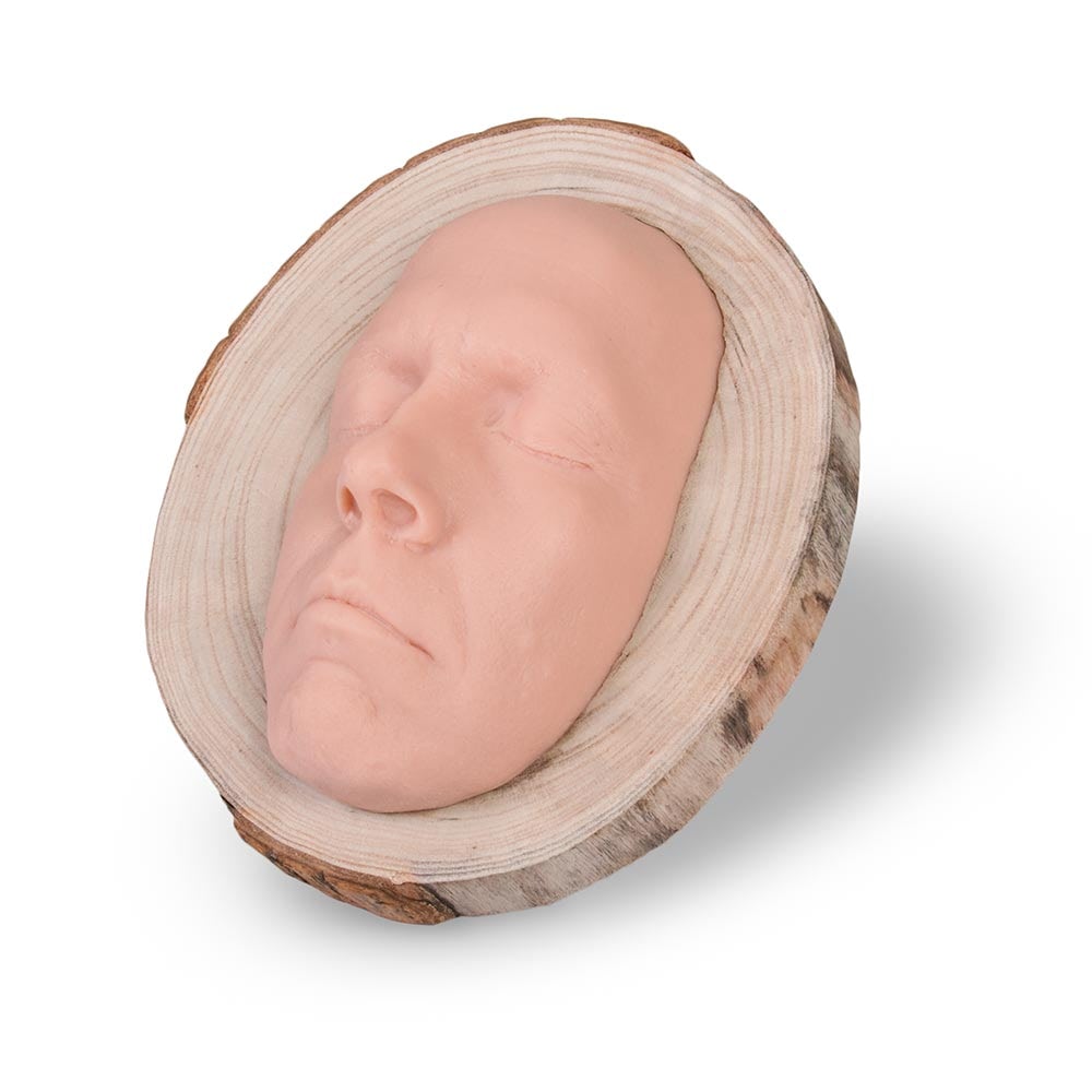 A Pound of Flesh Tattooable Idol Face on Wooden Plank — Front View