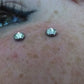 These Smaller 16g Titanium Surface Barbells Are Perfect for Anti-Eyebrow Piercings Like the One Shown Here