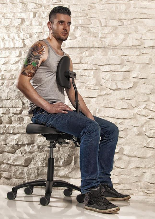 Precision Professional Tattoo Stool - Lifestyle Image Client Leaning Forward