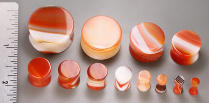 Double Flare Red Agate Stone Plug — Price Per Pair - Painful Pleasures