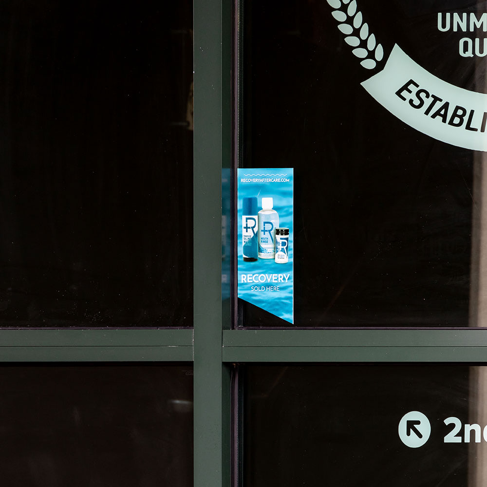 Recovery Sold Here Window Cling with Water Background on Display