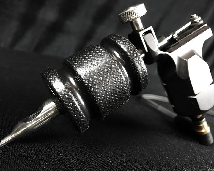 True Rogue Disposable Cartridge Tube Grips on Hex Machine — Close Up
