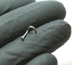 Close-up of fishtail that's been converted to a nose screw