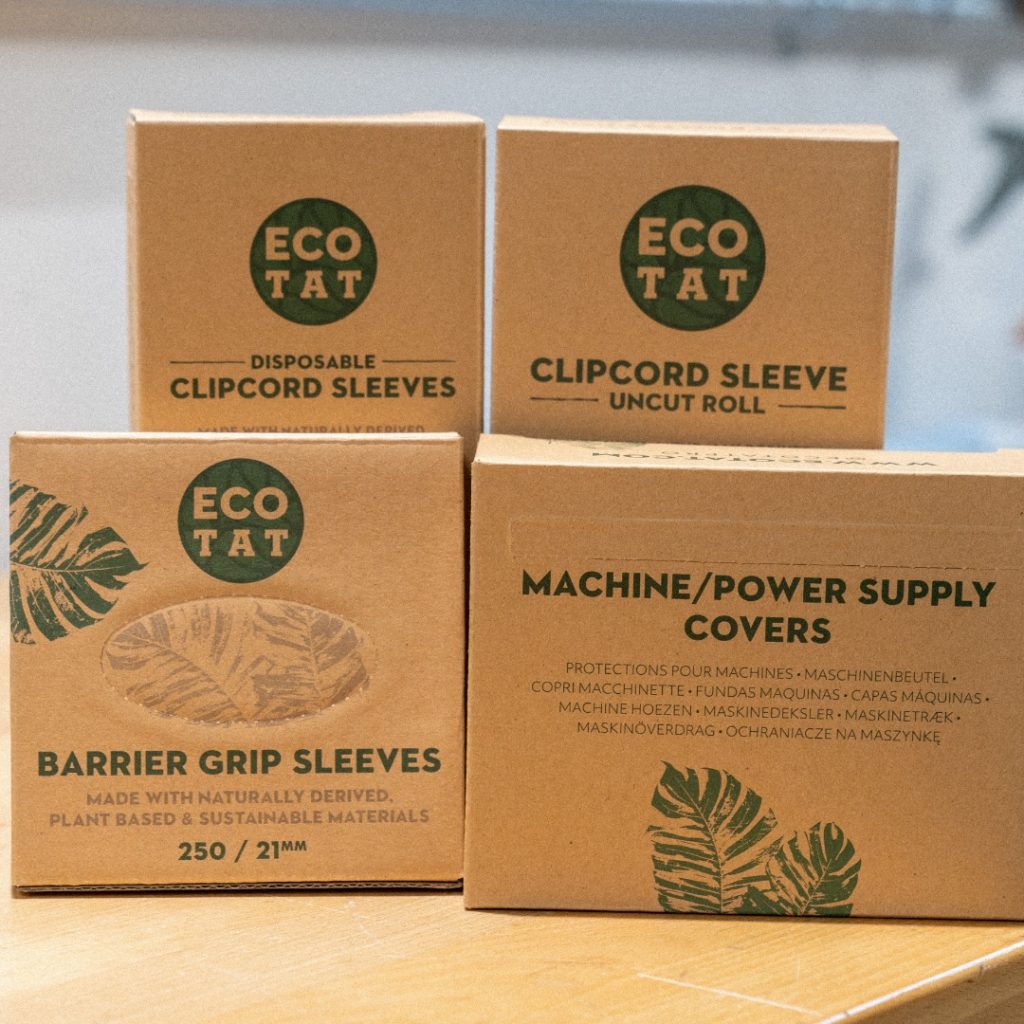 Variety of eco-friendly biodegradable tattoo supplies in boxes