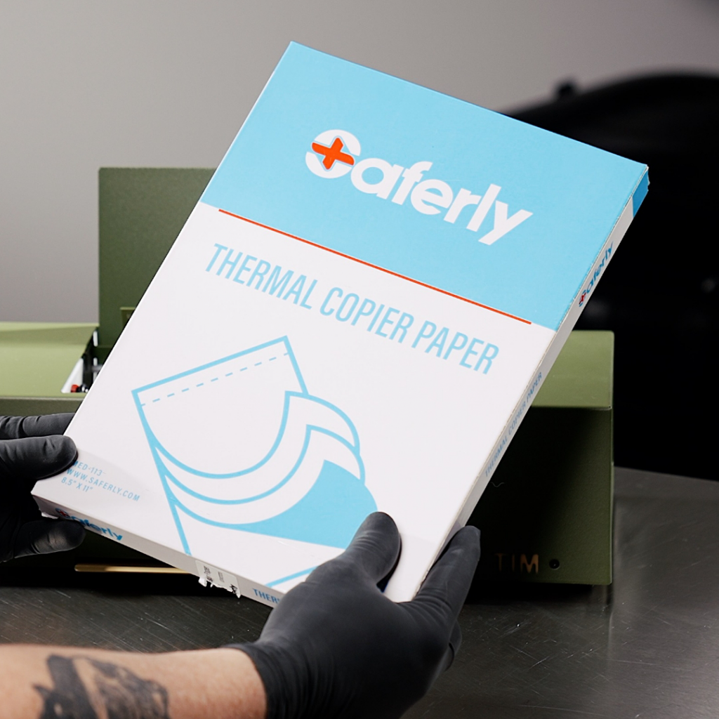 Close-up of tattoo stencil paper packaging by Saferly