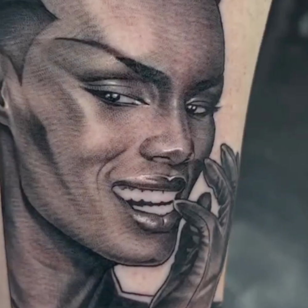 Black and gray Black Americana tattoo by artist Oba Jackson