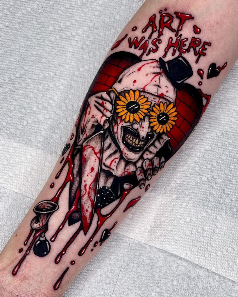 Art the Clown tattoo in sunflower glasses by @angeloparente