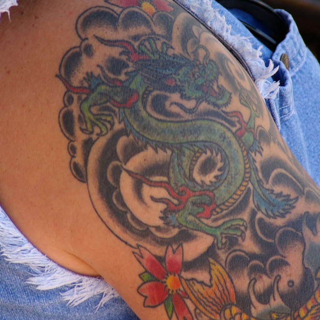A tattooed upper arm.