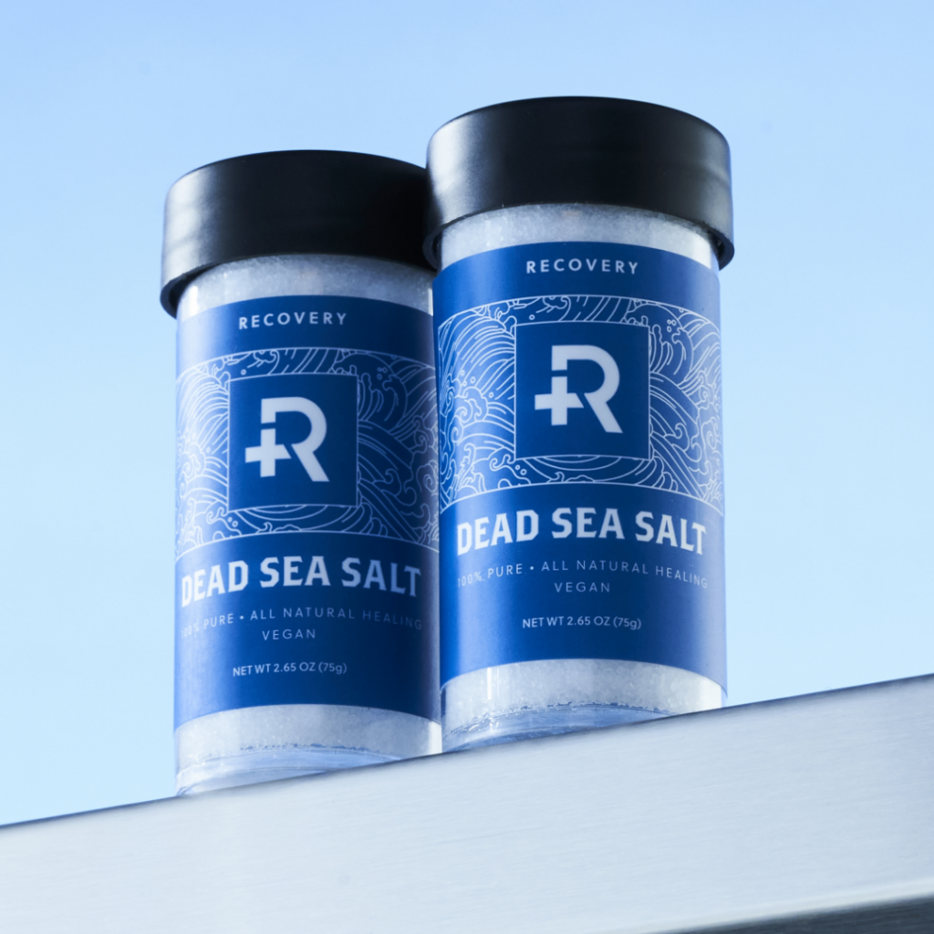 Two bottles of Recovery Dead Sea Salt.